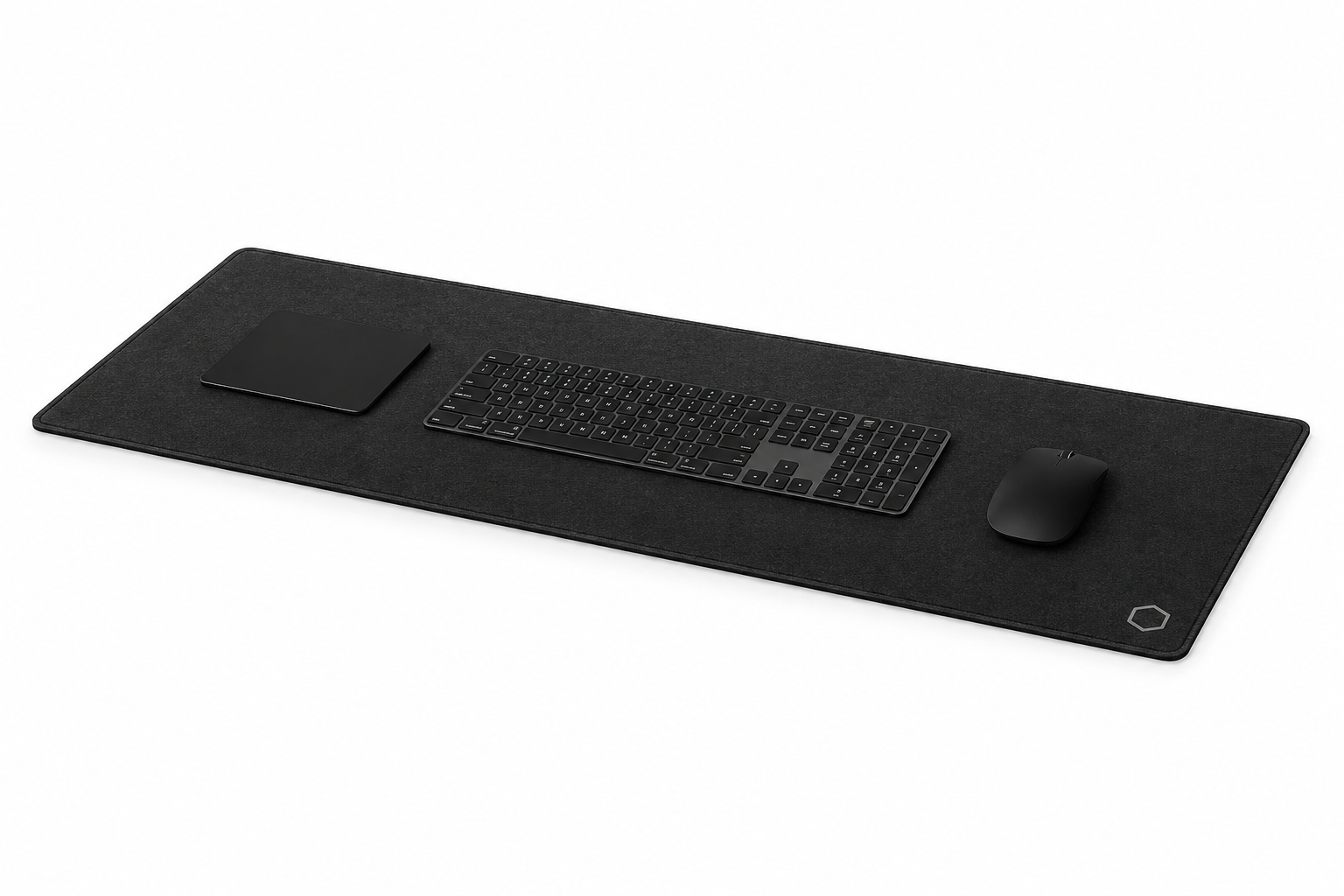 Side profile perspective of the black Difavo desk mat with keyboard, mouse and trackpad, showing its low-profile edge