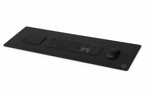 Side profile perspective of the black Difavo desk mat with keyboard, mouse and trackpad, showing its low-profile edge