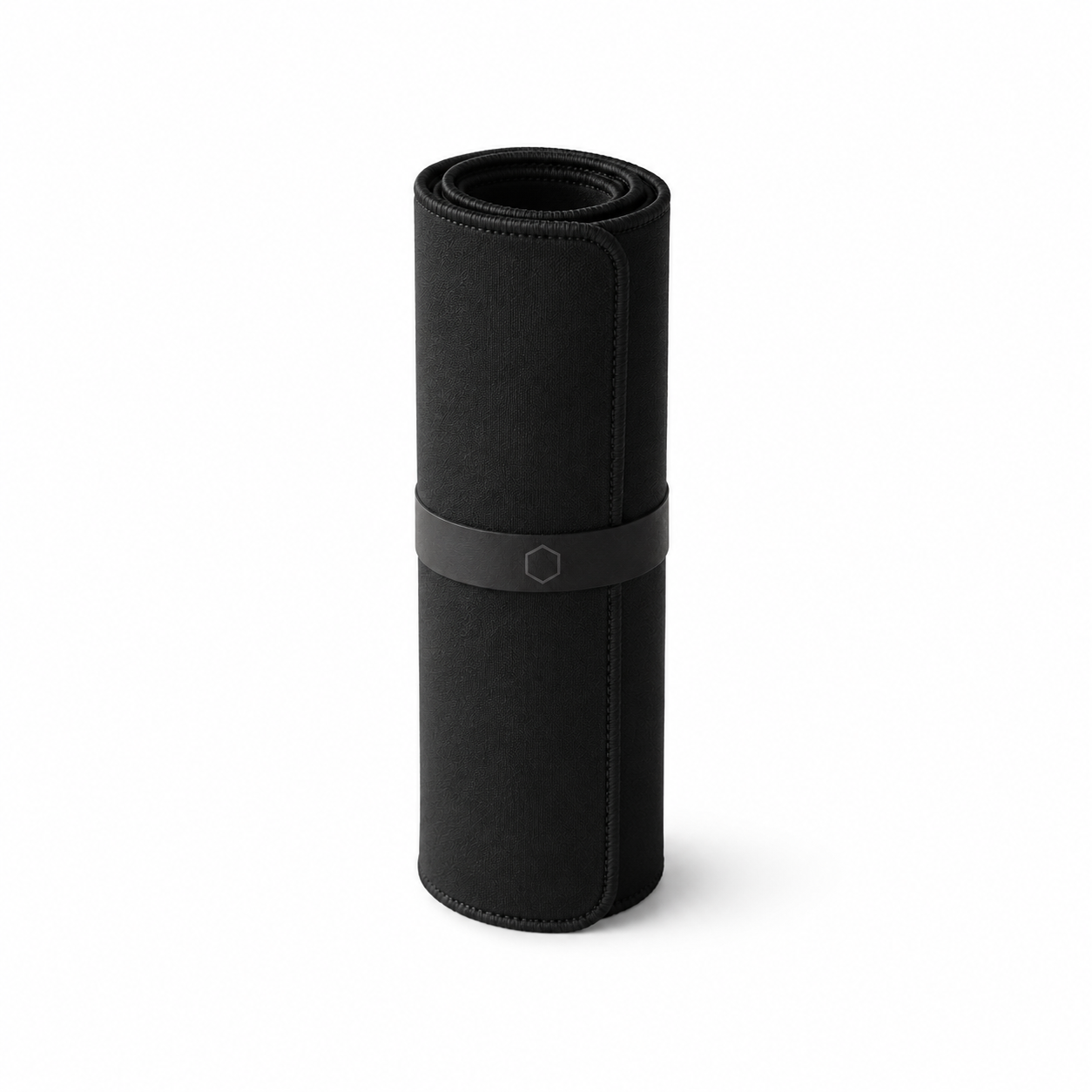 Black Difavo Desk Mat rolled into a neat cylinder, showing how it ships